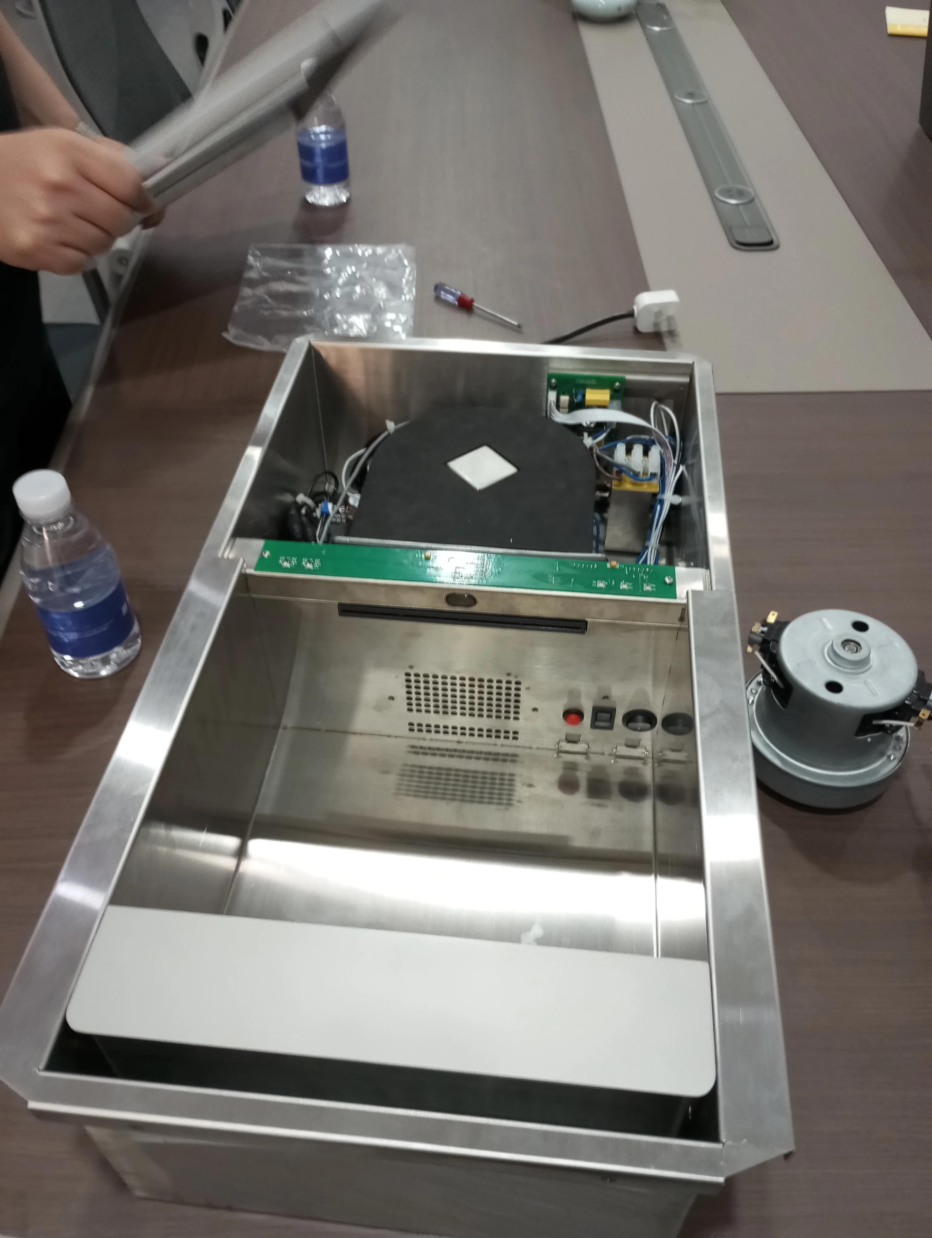 Teardown of commercial hand dryer chassis for motor integration