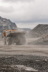 Open-pit mining site with haul trucks