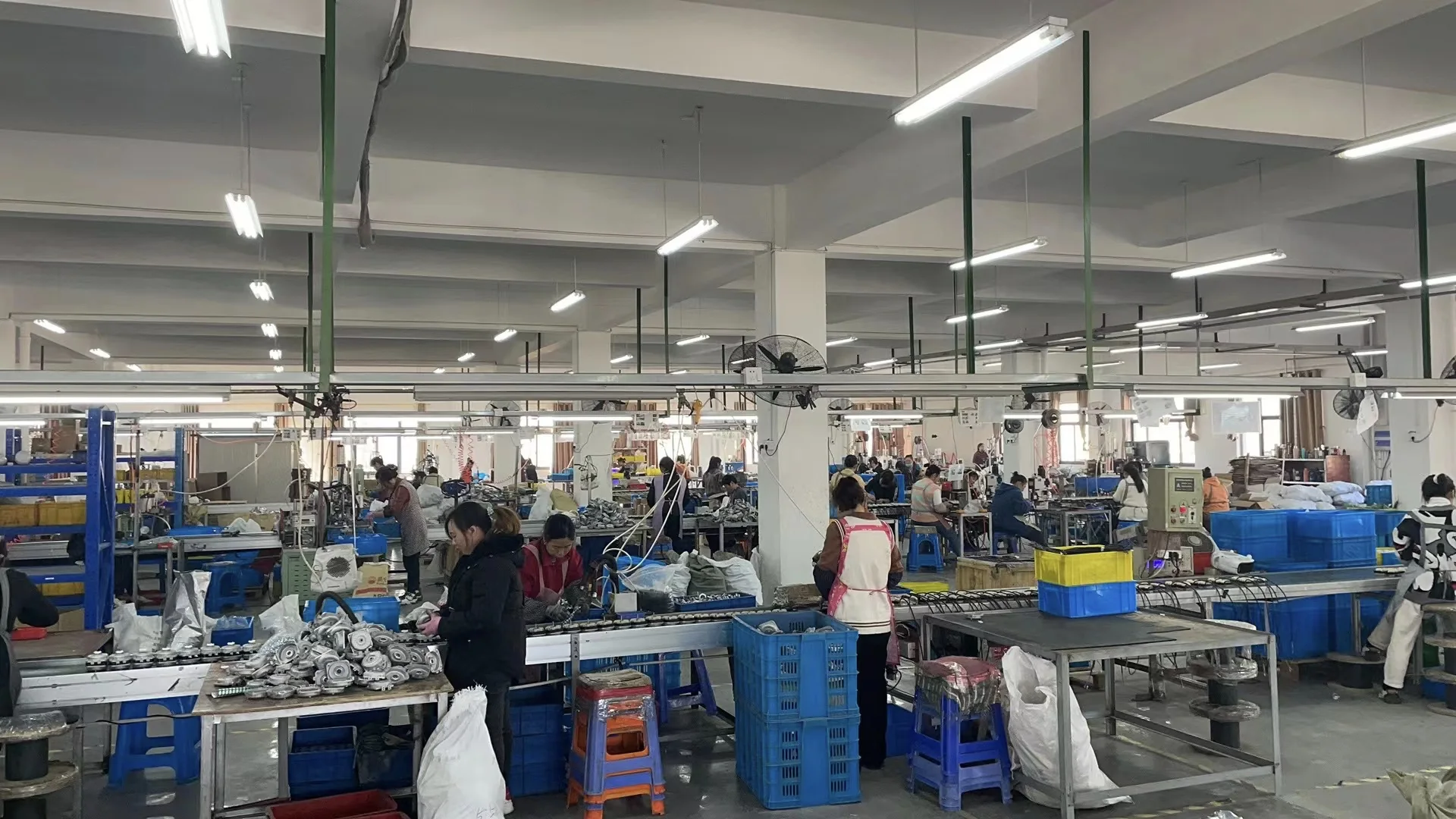 Wide view of the LONGWELL fan assembly floor in China.