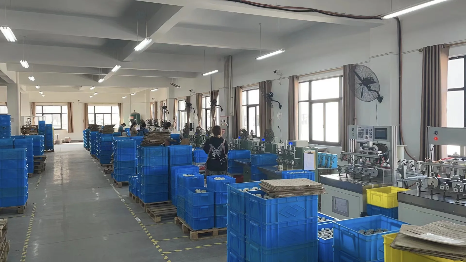 Organized production line behind customer and OEM project discussions.