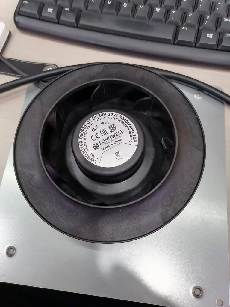 LWBD3G160-060PM-01 EC backward-curved fan nameplate showing 24 V DC, 22 W, 3040 rpm, Class F, IP23, CE and EAC marks
